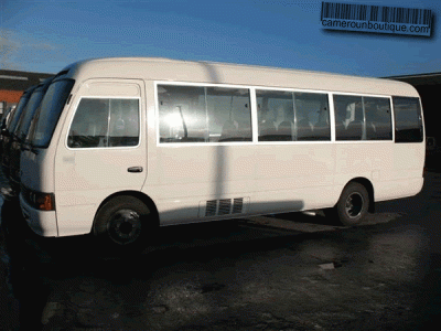 Location voiture mini bus Toyota Coaster à Douala